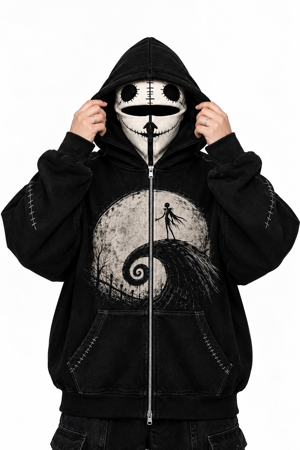 Nightmare Hoodie studio model holding the outer hood